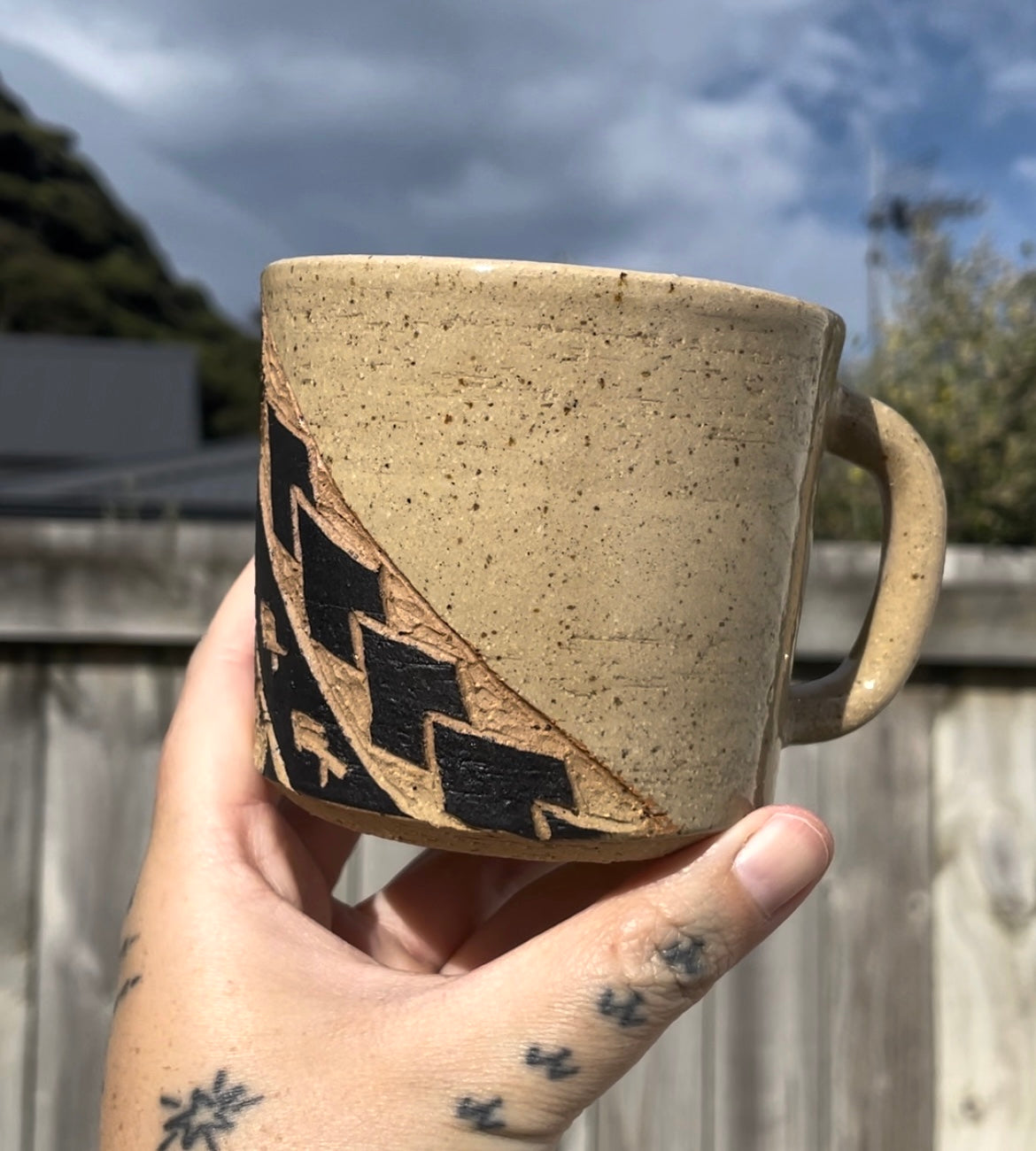 Hand Carved Ceramic Tatau Mug Brown (138) by MASINA CREATIVE