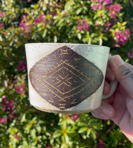 Hand Carved Ceramic Malu Mug (202) by MASINA CREATIVE